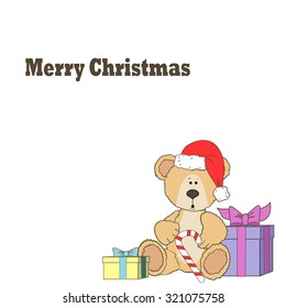 Christmas Teddy bear isolated on a white background with achristmas lolipoop and gifts