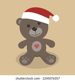 Christmas teddy bear on colored background 