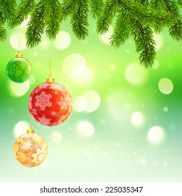 Christmas template with hanging Christmas balls fir tree branches on green bokeh background