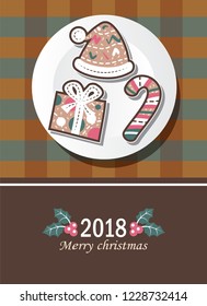 Christmas theme design with cookies placed on the plate and greetings in 2018.
