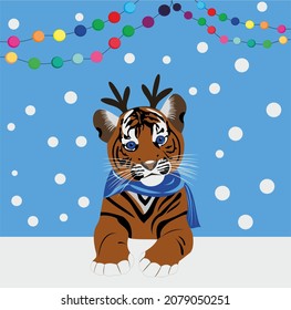 christmas tiger cub with a rim in the form of deer horns new year 2022
