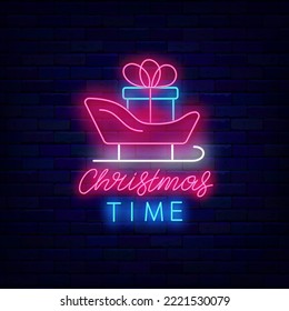 Christmas time neon signboard. Santa Claus sleigh with present icon. Colorful lettering advertising. Shiny Greeting card. December holiday. Glowing banner. Editable stroke. Vector illustration