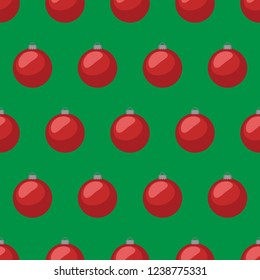 Christmas toys. Christmas balls. Red balls. Pattern. Green background.
