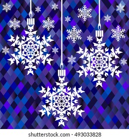 Christmas toys in the form of snowflakes on a background of blue rhombuses