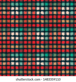 Christmas traditional scottish plaid gingham seamless pattern. Red green holiday textured all over print. Vector swatch