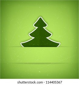 Christmas tree applique vector background. A slight texture gives it an aged paper feeling.Space for your text.