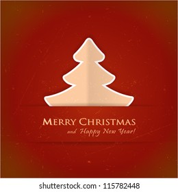 Christmas tree applique vector background. A slight texture gives it an aged paper feeling.Space for your text.