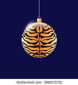 Christmas tree ball toy with tiger animalistic print.