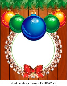Christmas tree with baubles on wood texture.