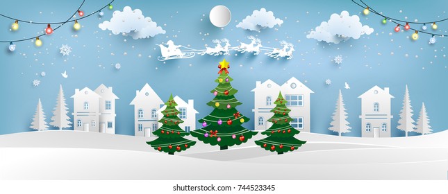 Christmas tree with beautiful lamps decorate the tree. there are homes and snowy hills. design paper art and crafts