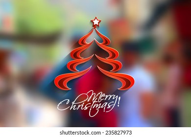 Christmas tree in the blur background with space for text 