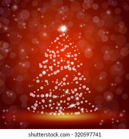 christmas tree with bokeh on red background