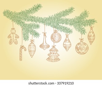 Christmas tree branch with holiday toys, balls and sweets as a card with space for text