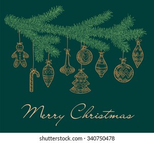 Christmas tree branch with holiday toys, balls and sweets as a card with space for text