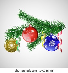 Christmas tree branch with three Xmas balls and serpentine