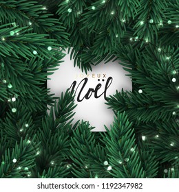 Christmas tree branches. Frame of green branch of pine and gold string garland lights. Festive Xmas border