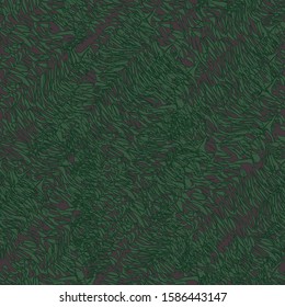 Christmas tree branches on the dark background.