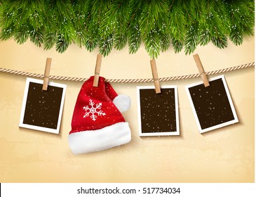 Christmas tree branches with photos and a Santa hat. Vector.