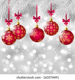 Christmas tree branches with pink balls