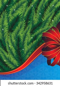 Christmas tree branches with red bow and ribbon