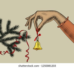 Christmas tree cards. Woman's hand with retro bell on red ribbon.  Vintage engraving stylized drawing. Vector illustration