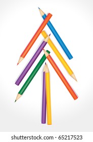 Christmas tree composed of colored pencils on white background