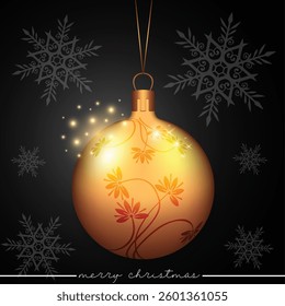 Christmas tree decorated bauble with a flower leave pattern design set against a black backdrop.