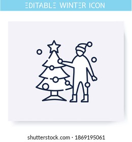 Weihnachtsbaumschmuck-Symbol. Der Mensch schmückt den Weihnachtskiefer. Winterurlaub und Freizeitkonzept. Weihnachtsstimmung. Dekorationen im neuen Jahr. Einzige Vektorgrafik. Bearbeitbarer Hub 