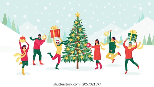 Christmas Tree with Decoration Balls, Garland, Baubles. Friends Celebrating Xmas. People Wish Merry Christmas and Happy New Year. Holiday Greeting. Cheerful People Jumping with Gift Boxes