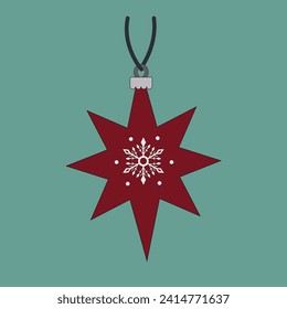 Christmas tree decoration in the shape of a star with a pattern.