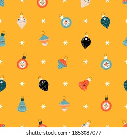 Christmas tree decorations on a yellow background seamless vintage pattern. Cute cartoony illustrated pattern for web, stationery, textiles, card and invitation design. Modern winter holiday pattern. 