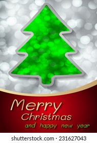 Christmas tree with defocused glowing lights. gray background 