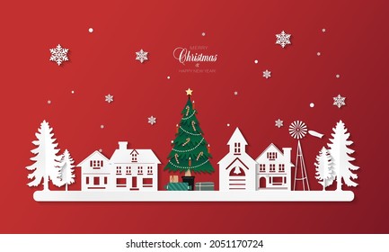 Christmas tree with gifts in a winter town. Vector illustration in paper cut style