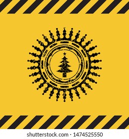 christmas tree icon black grunge emblem inside yellow warning sign. Vector Illustration. Detailed.