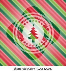 christmas tree icon inside christmas badge.