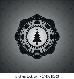 christmas tree icon inside black emblem