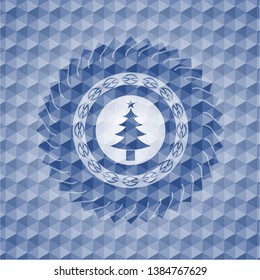 christmas tree icon inside blue badge with geometric pattern.