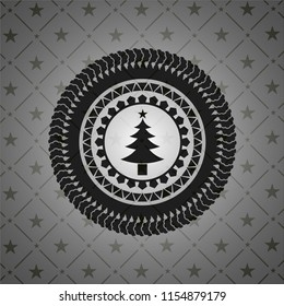 christmas tree icon inside dark emblem. Retro