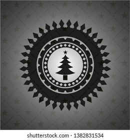 christmas tree icon inside dark badge or emblem