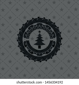 christmas tree icon inside dark emblem. Retro