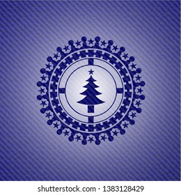 christmas tree icon inside denim background