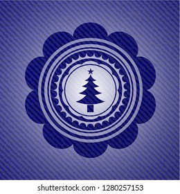 christmas tree icon inside emblem with jean high quality background