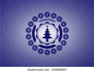 christmas tree icon inside emblem with jean high quality background