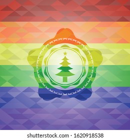 christmas tree icon inside emblem on mosaic background with the colors of the LGBT flag