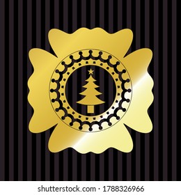 christmas tree icon inside gold emblem. 