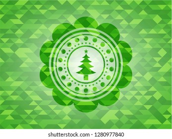 christmas tree icon inside green emblem with mosaic ecological style background