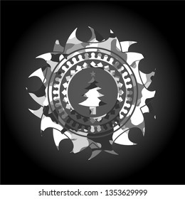 christmas tree icon inside grey camouflaged emblem