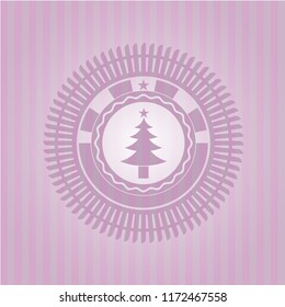 christmas tree icon inside pink emblem