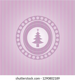 christmas tree icon inside pink emblem. Vintage.