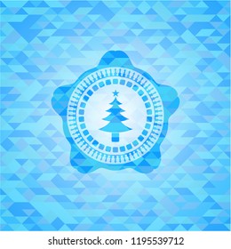 christmas tree icon inside realistic sky blue mosaic emblem
